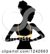 Clipart Of A Black Silhouetted Woman Unclasping Her Bra Royalty Free Vector Illustration by BNP Design Studio