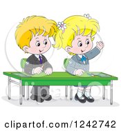 Blond School Children At Their Desk