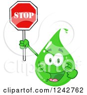 Clipart Of A Green Eco Water Drop Character Holding And Pointing To A Stop Sign Royalty Free Vector Illustration
