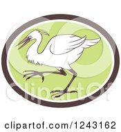 Retro Egret Heron Or Crane Bird In A Green Oval