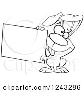 Clipart Of A Black And White Cartoon Easter Bunny Rabbit Holding A Sign Royalty Free Vector Illustration