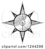 Clipart Of A Gold Compass Pointing North Royalty Free Vector Illustration by Lal Perera