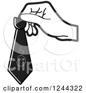 Clipart Of A Black And White Hand Holding A Tie Royalty Free Vector Illustration