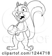 Clipart Of A Black And White Squirrel With An Acorn Royalty Free Vector Illustration