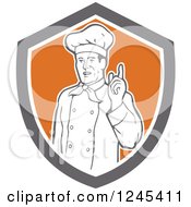 Poster, Art Print Of Retro Male Chef Holding Up A Finger In A Shield