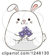 Clipart Of A White Bunny Rabbit Holding Flowers Royalty Free Vector Illustration