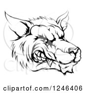 Clipart Of A Black And White Snarling Aggressive Wolf Mascot Head Royalty Free Vector Illustration