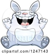 Clipart Of A Fat Blue Rabbit Sitting And Cheering Royalty Free Vector Illustration