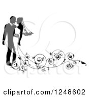 Clipart Of A Black And White Silhouetted Wedding Couple With A Swirl Train Royalty Free Vector Illustration by AtStockIllustration #COLLC1248602-0021