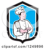 Clipart Of A Cartoon Male Chef With Folded Arms And A Knife In A Blue And Black Shield Royalty Free Vector Illustration