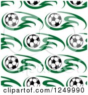 Clipart Of A Seamless Background Pattern Of Soccer Balls And Green Royalty Free Vector Illustration