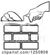 Clipart Of A Mason Hand Laying Bricks 2 Royalty Free Vector Illustration