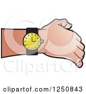 Hand Showing A Black And Gold Wrist Watch
