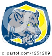 Clipart Of An Angry Wolf In A Blue And Yellow Shield Royalty Free Vector Illustration