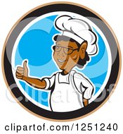 Clipart Of A Cartoon African American Male Chef Holding A Thumb Up In A Circle Royalty Free Vector Illustration
