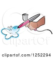 Poster, Art Print Of Hand Airbrushing A Butterfly