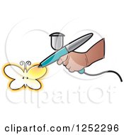 Clipart Of A Hand Airbrushing A Yellow Butterfly Royalty Free Vector Illustration