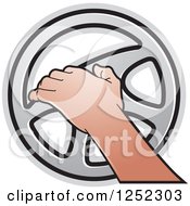 Poster, Art Print Of Hand Operating A Silver Steering Wheel