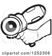 Clipart Of A Black And White Hand Holding A Sander Machine Royalty Free Vector Illustration by Lal Perera