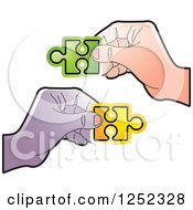 Poster, Art Print Of Hands Holding Jigsaw Puzzle Pieces