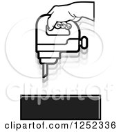 Clipart Of A Black And White Hand Operating A Drill Royalty Free Vector Illustration by Lal Perera