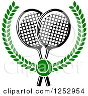 Green Tennis Ball Over Crossed Rackets In A Laurel Wreath
