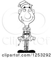 Clipart Of A Black And White Man Christmas Elf Tangled In Lights Royalty Free Vector Illustration
