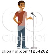 Casual Handsome Young Black Man Speaking Into A Microphone