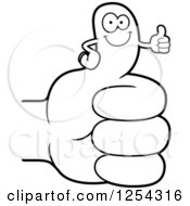 Clipart Of A Black And White Happy Thumb Up Character On A Hand Royalty Free Vector Illustration