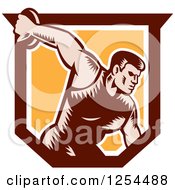 Poster, Art Print Of Retro Woodcut Male Discus Thrower In An Orange And Brown Shield