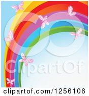 Clipart Of A Rainbow Swoosh And Pink Butterflies Over Blue Royalty Free Vector Illustration