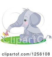 Poster, Art Print Of Cute Baby Elephant Smelling A Butterfly On A Flower