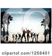 Silhouetted People Dancing Between Palm Trees At Sunset