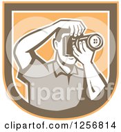 Poster, Art Print Of Retro Male Photographer Taking Pictures In An Orange Brown And White Shield
