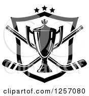 Clipart Of A Black And White Trophy Cup Over Crossed Hockey Sticks A Shield And Stars Royalty Free Vector Illustration