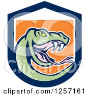 Cartoon Green Rattle Snake In A Blue White And Orange Shield