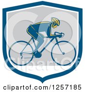 Poster, Art Print Of Retro Male Cyclist In A Blue White And Gray Shield