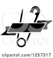 Clipart Of A Black And White Safety Pin With A Ribbon Banner Royalty Free Vector Illustration