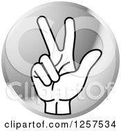 Round Silver Icon Of A Counting Hand Holding Up 3 Fingers Three In Sign Language