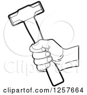 Clipart Of A Black And White Hand Holding A Hammer Royalty Free Vector Illustration