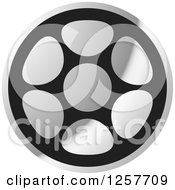 Clipart Of A Grayscale Film Reel Royalty Free Vector Illustration by Lal Perera