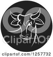 Clipart Of A White Bull In A Black Circle Royalty Free Vector Illustration