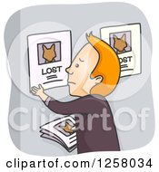 Sad Red Haired White Man Putting Lost Pet Signs On A Bulletin