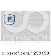 Clipart Of A Retro Cyclist And Rays Business Card Design Royalty Free Illustration
