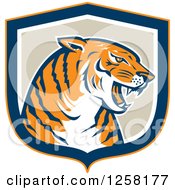 Poster, Art Print Of Retro Growling Tiger Head In A Blue Orange White And Tan Shield