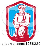 Retro Male Blacksmith Man With A Hammer In A Red White And Blue Shield