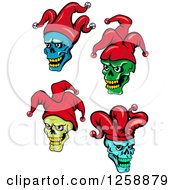 Clipart Of Joker Faces In Red Hats Royalty Free Vector Illustration