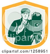 Poster, Art Print Of Retro Male Photographer With A Bellows Camera In A Yellow White And Green Shield