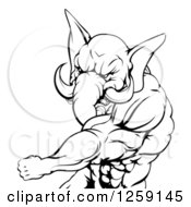 Clipart Of A Black And White Punching Muscular Elephant Man Mascot Royalty Free Vector Illustration