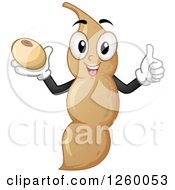 Clipart Of A Happy Soy Bean Holding A Thumb Up Royalty Free Vector Illustration